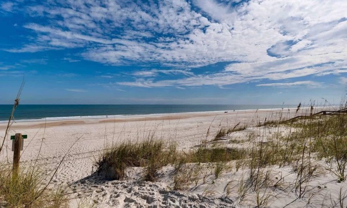 Neptune Beach Condo | Beautiful Beach Condo - just steps to the beach!
