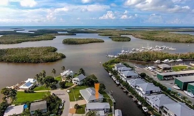 Goodland House | Beautiful canal facing home with inground pool! In charming Goodland Florida!