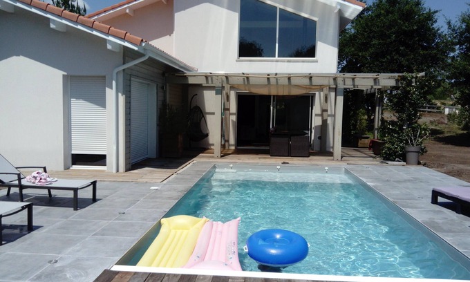 Gourbera House | beautiful contemporary house on raised ground with swimming pool and pool house