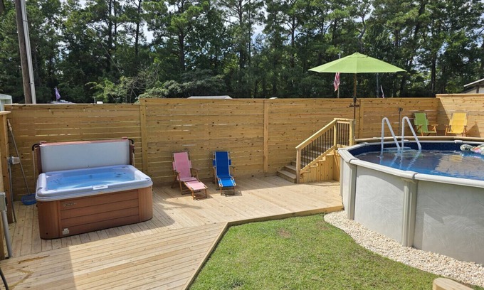 Peletier House | Beautiful home with a private Hottub and Pool, only three miles from Emerald Isle Beach
