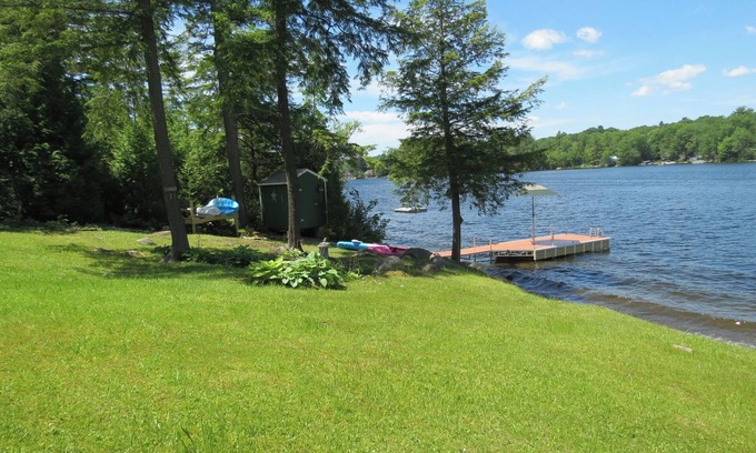 Oakland House | Beautiful lakeside 4 bedroom retreat with private dock and walkout basement