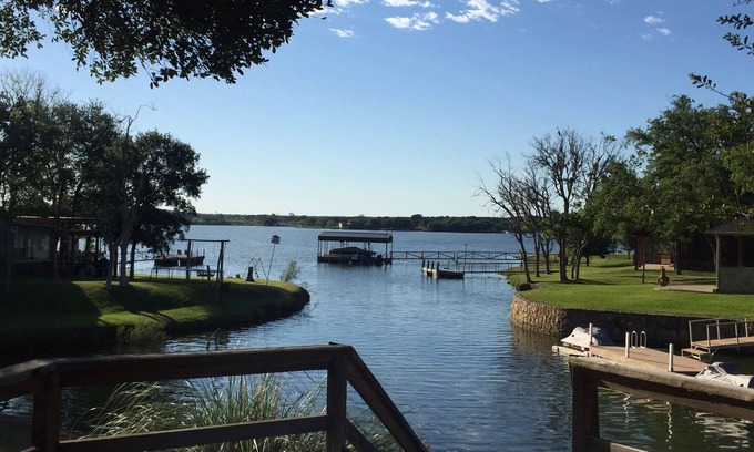 Graford House | Beautiful Peninsula Lake Front Resort Home, Tucked Away in a Beautiful Cove ,
