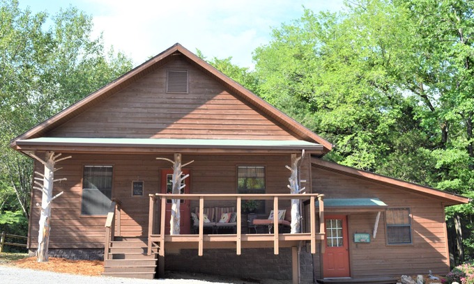 Flippin House | Beautiful River House that sits on the banks of the White River, with docks.