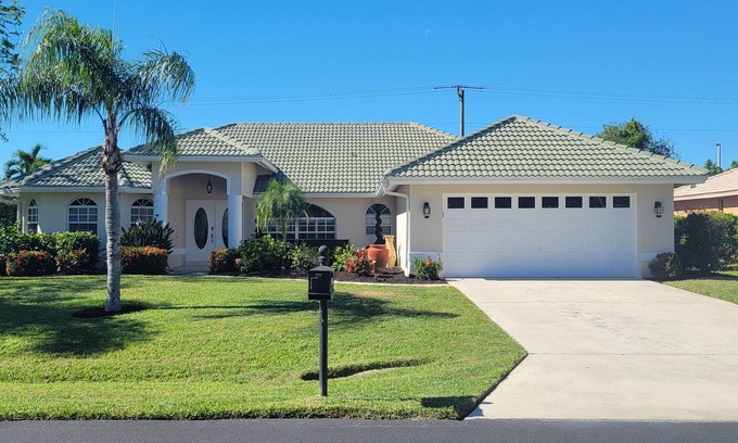 Bonita Springs House | Beautiful Tropical Inspired Pool Home in Private Community <2 Miles To Beach