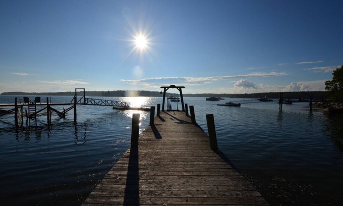 Spruce Head Cottage | Berry Cottage, private dock, overlooking a sandy beach and bustling harbor