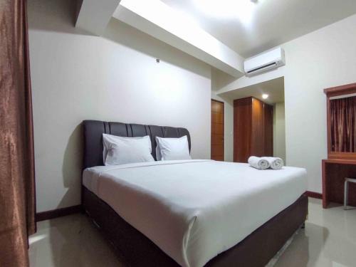 Panakkukang Apartment | Big and Comfy 3BR at Vida View Apartement By Travelio