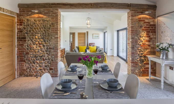 North Walsham House | Big Sky Barn is a contemporary conversion of a 200 year old brick and flint barn