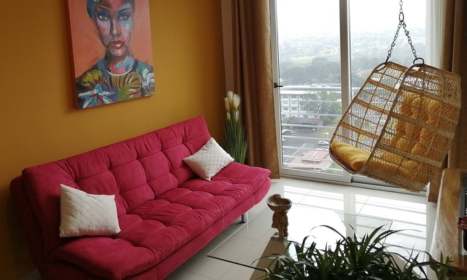 Heredia Apartment | BOHO CHIC STYLE CONDO, NEAR THE AIRPORT W/ SELF CHECK-IN