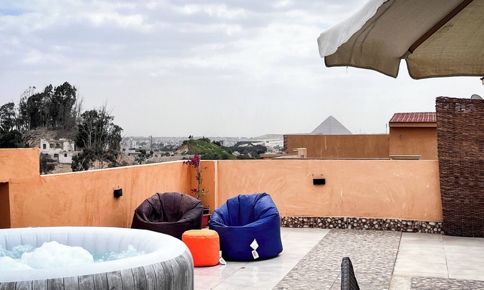 Giza Apartment | Boho Getaway with Pyramids View & Jacuzzi
