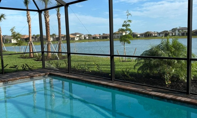Estero House | Brand New! 4 Bedroom home with a Heated pool in Gated Community
