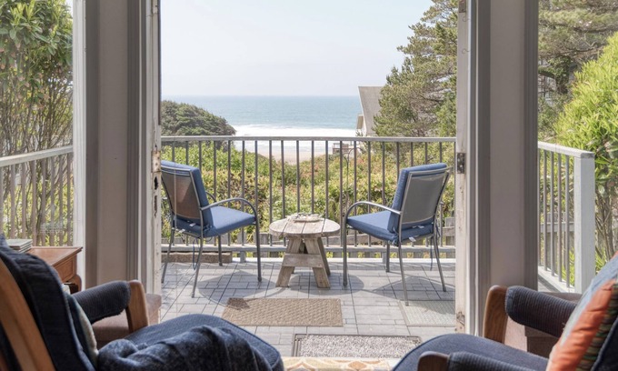 Lincoln Beach House | Breeze Cottage is the perfect romatic getaway, enjoy ocean views from the deck.
