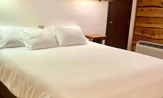 Tomahawk Cabin | Bridge Inn 2nd Floor1 KingBed Balcony River View