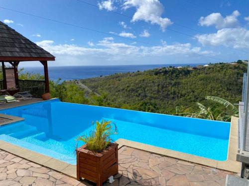 Marigot House | Bungalow idyllique à Vieux-Habitants avec vue sur la mer