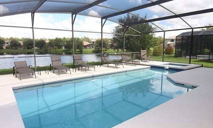 Calabria House | Calabria Lakeside Villa w Private Pool, Spa, Game Room - Minutes to Disney