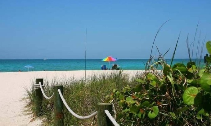 Whitney Beach Cottage | Canal front cottage, walking distance to sandy Gulf
