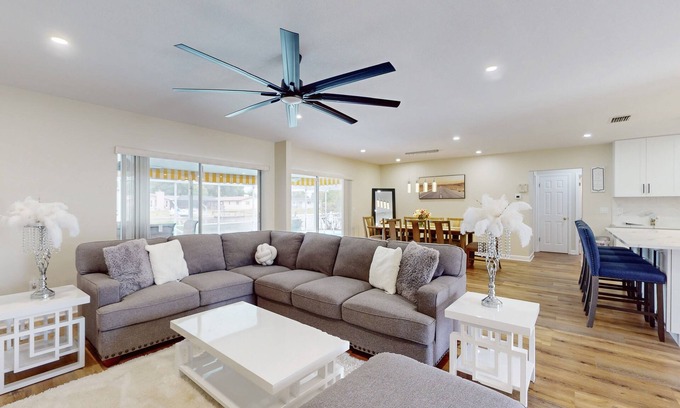Clearwater House | Canal-front home with private pool, dock, grill, canal views, & W/D