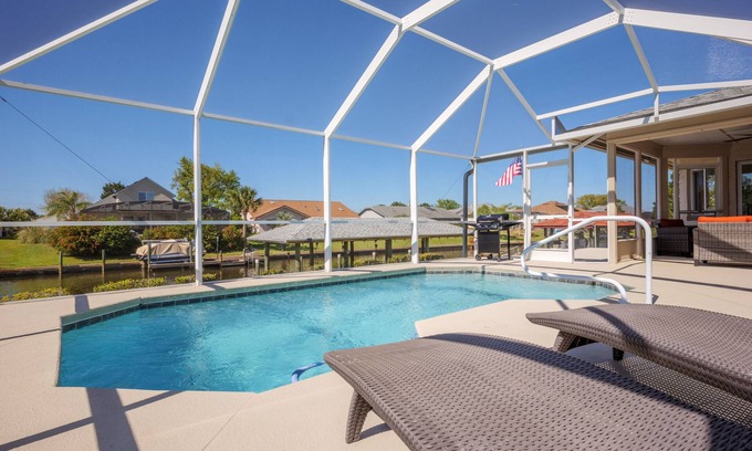 Palm Harbor House | Canal-Front House With Covered Deck, Pool, Dock + Prime Location