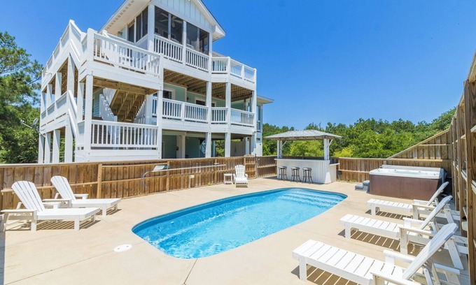 Carova Beach House | Canalfront 6BR home w/pool & hot tub on the beautiful 4x4 beaches of Carova!