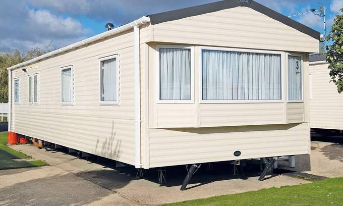 Alford House | Caravan with one double and two twin.