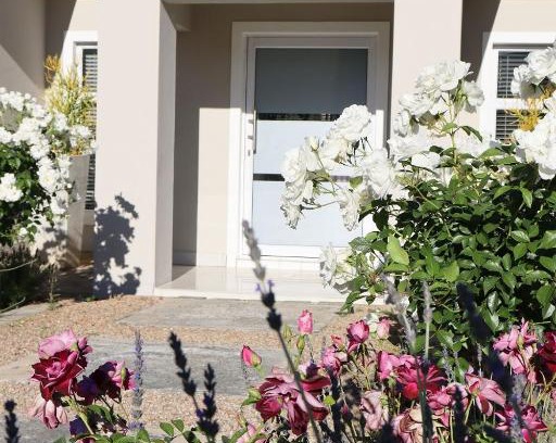 Oudtshoorn House | Casa Blanca