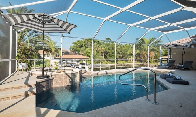 Palm Harbor House | Casa Canal Waterfront Heated Pool & Spa Retreat