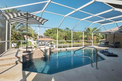 Palm Harbor House | Casa Canal Waterfront Heated Pool & Spa Retreat