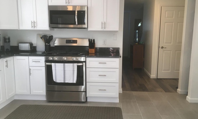 Traverse City House | Centrally located 2-bedroom townhome near it all.