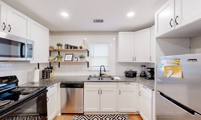 West End House | Centrally located West End home with 2 apts, AC, & W/D - dog-friendly