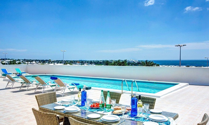 Playa Blanca Villa | Chalet Casa Paula with Sea and Mountain View, Pool, Garden & Wi-Fi