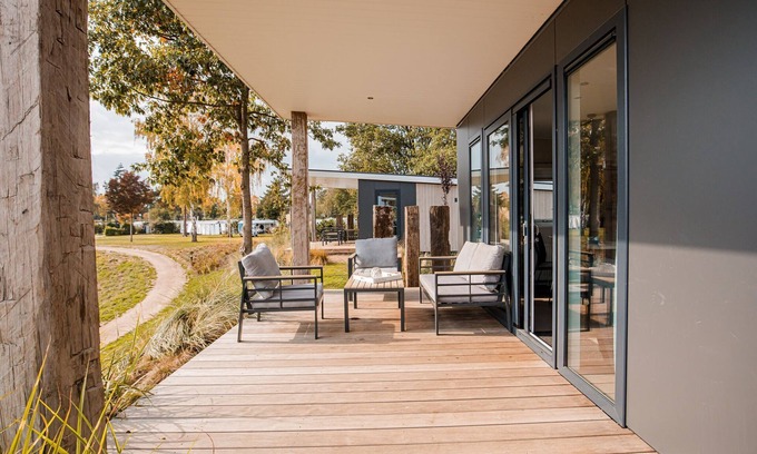 Leuken Ski Chalet | Chalet with a view of the beach or harbour, in a holiday park on the Leukermeer
