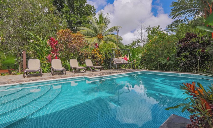 Penas Blancas House | Chalet with exuberant gardens, r and farm 4 Bukala Village Lodge