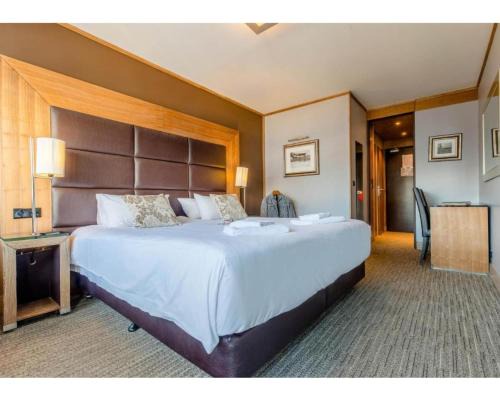 Les Deux Alpes Hotel | Chambre Hôtel Ibiza Spa - Hammam - Jacuzzis - Piscine Chauffée