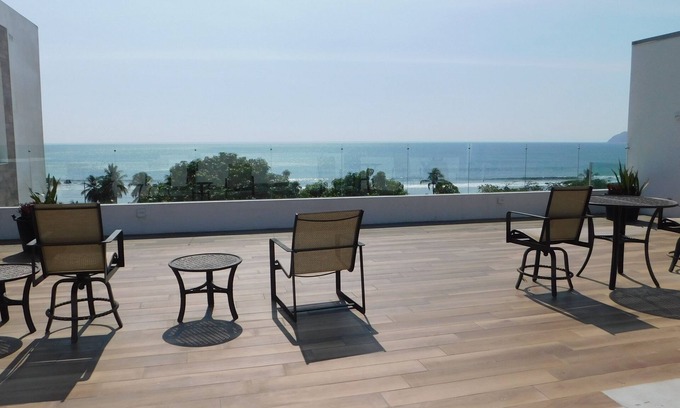 Jaco Condo | Charming 2-bedroom condo with WiFi and AC in Jaco, sleeps six, next door to pool