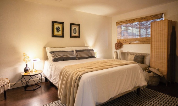Gold Hill House | Charming 2-bedroom riverfront cottage! Enjoy a wood stove, W/D, and private hot tub overlooking the Rogue River. Perfect Gold Hill getaway for couples or a small family retreat.