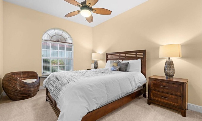 Waters Edge House | Charming 3-bedroom lake house in Fort Myers with screened-in pool & hot tub.