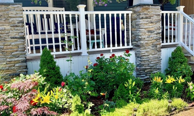 Ludington House | Charming 4-bedroom house sleeps 15 in the wonderful beach town of Ludington!