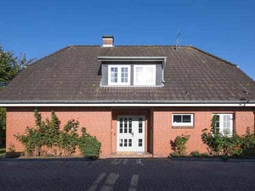 Aventoft Apartment | Charming and cozy holiday home with a fireplace