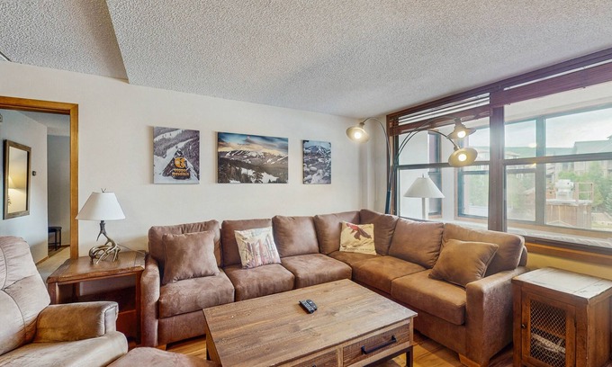 Copper Mountain Village House | Charming condo with a private sunroom, kitchen, & hot tub - walk to lift