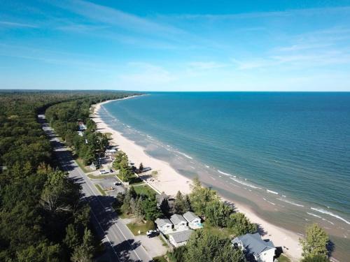 Oscoda House | Charming Lake Huron Cottage Private Beach Access