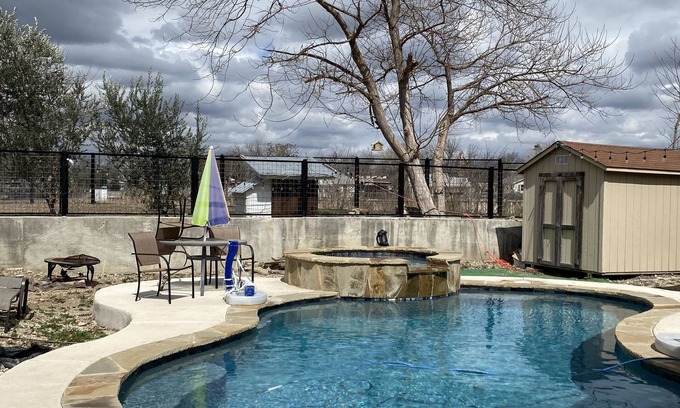 Southside House | Cheerful oasis home with pool and hot tub. 2.5 miles from downtown.