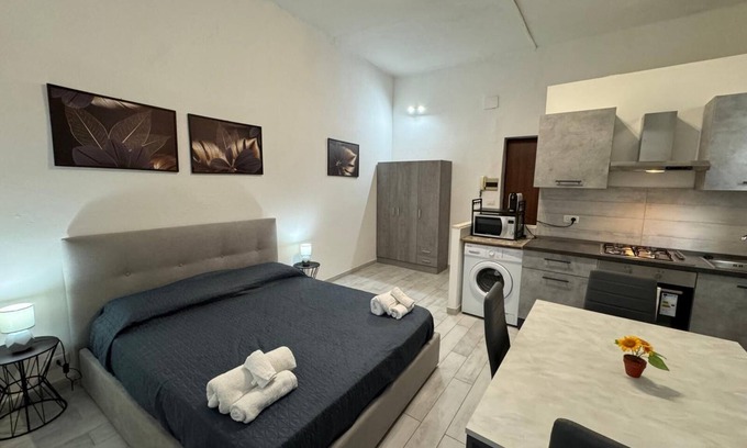Sassari Apartment | Civic 10 II Spacious studio apartment with terrace above at Sassari Center