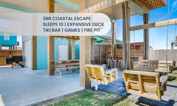 Galveston House | Coastal 3BR Retreat Sleeps 10 | Swing Deck, Tiki Bar, Grill & Fire Pit, Smart TVs & Pet-Friendly