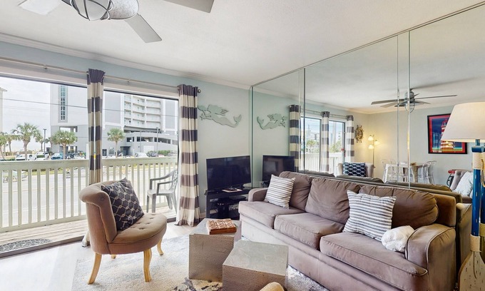 Gulf Shores Condo | Coastal condo 100 yards from the beach w/balcony - walk everywhere!