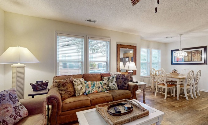 St. James Condo | Coastal Condo with golf course view and shared pool access