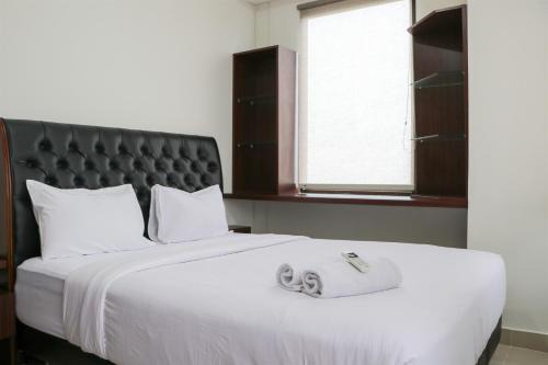Pinang Apartment | Comfort and Cozy Stay 2BR at 29th Floor Transpark Cibubur Apartment By Travelio