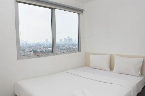 Cipulir Apartment | Comfort and Simply 2BR at Pakubuwono Terrace Apartment By Travelio
