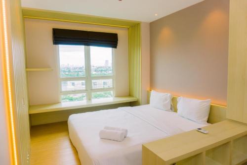 Jakarta Apartment | Comfortable and Modern Look 1BR at CitraLake Suites Apartment By Travelio