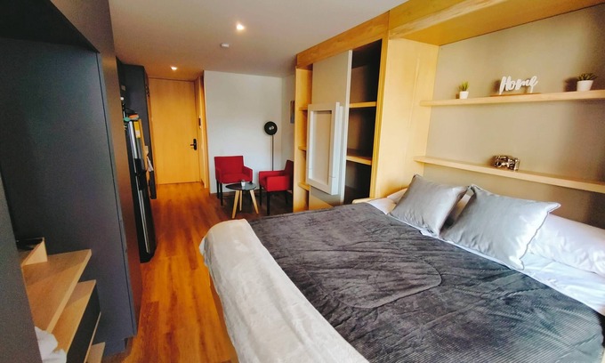 Centro International Apartment | Comfortable apartment with private terrace. Bogota International Center.