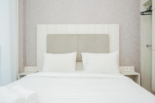 Serpong Apartment | Comfy and Minimalist Studio Apartment at Tree Park City BSD By Travelio