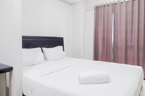 Serpong Apartment | Comfy and Modern Studio Room The Ayoma Apartment By Travelio